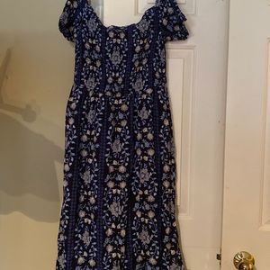 Blue dress with blue and white flowers.  Elastic top, lined